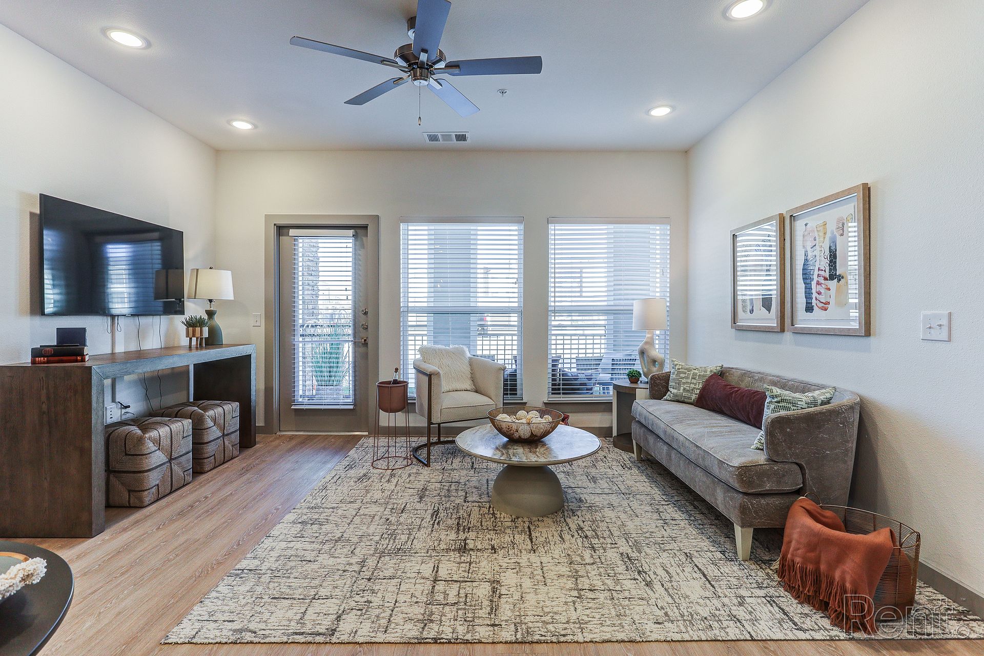 Staged living room in an apartment home at The Verge at Summer Park
